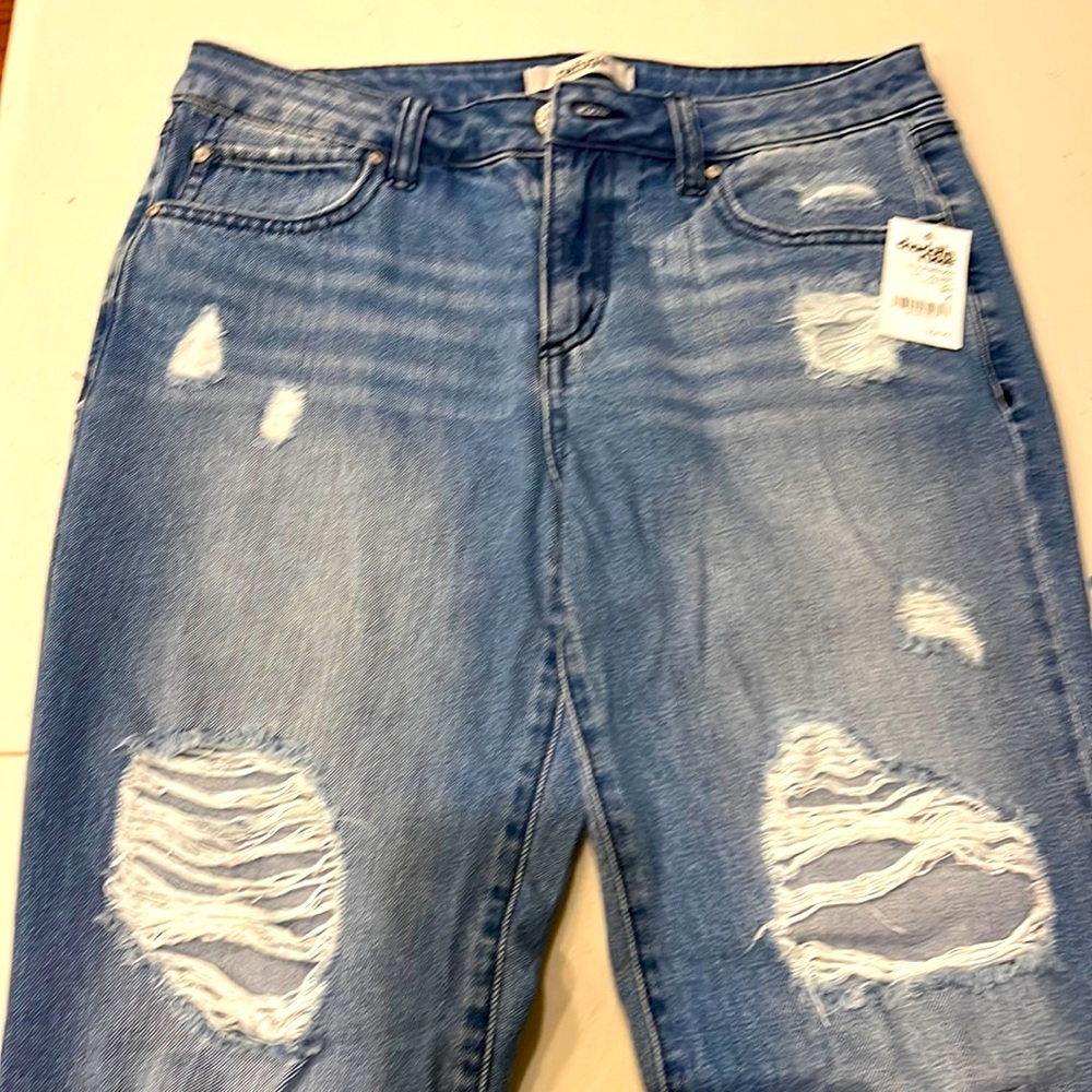 Size 4 Women’s distressed jeans